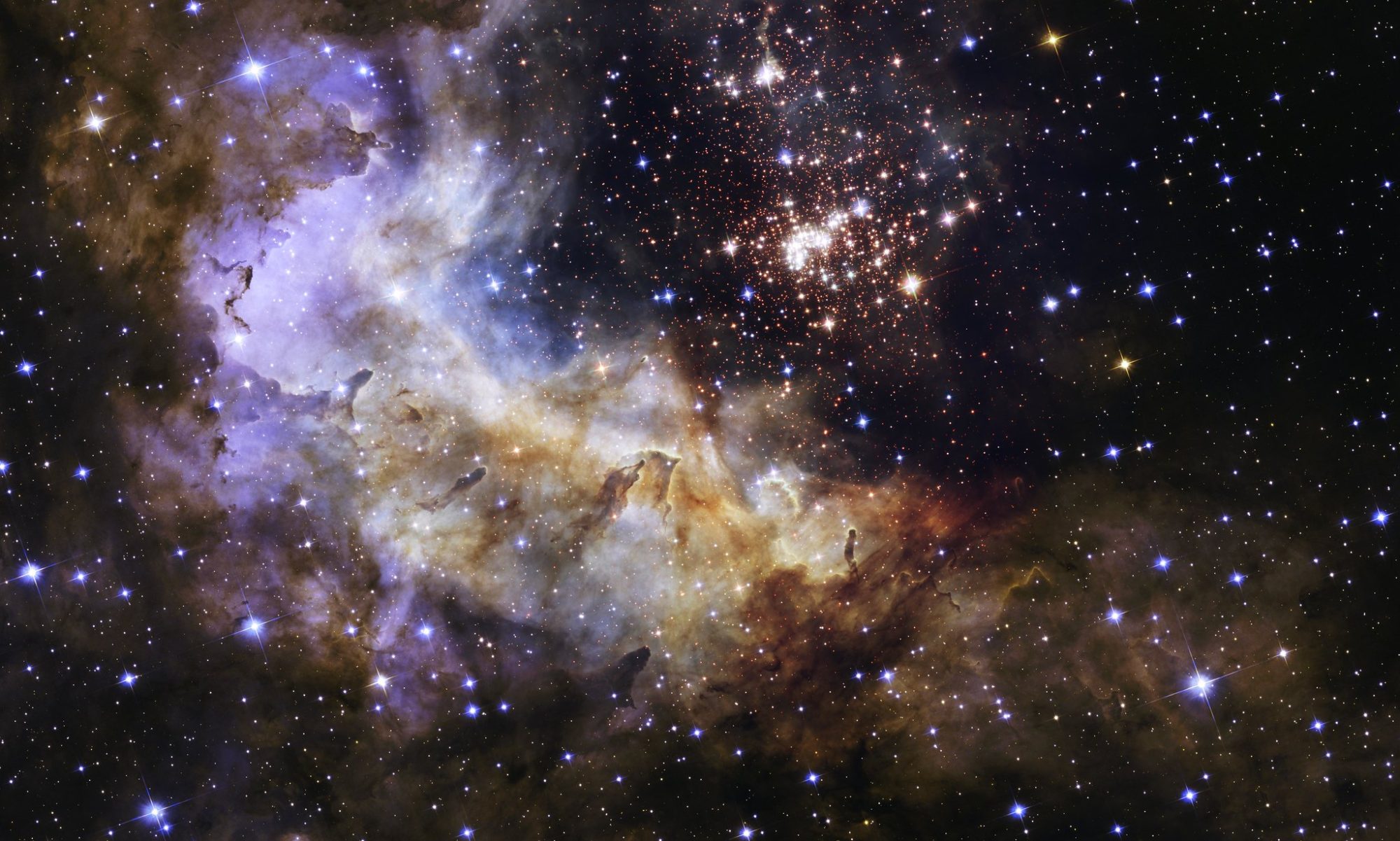 a picture of Westerlund 2, a giant cluster of 3,000 stars, resides in a raucous stellar breeding ground known as Gum 29